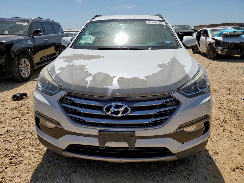 Photo 5 from auction – 2017 HYUNDAI SANTA FE S with VIN 5NMZU3LB7HH035091