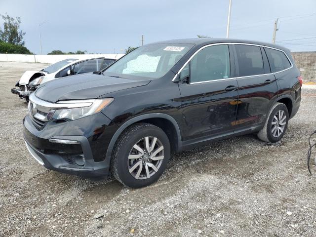 HONDA PILOT EXL 2021 with VIN 5FNYF5H50MB044229 - Photo from auction