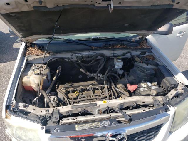 Photo 12 from auction – 2011 MAZDA TRIBUTE I with VIN 4F2CY0C76BKM06533
