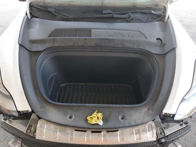Photo 12 from auction – 2021 TESLA MODEL Y with VIN 5YJYGDEE8MF074719