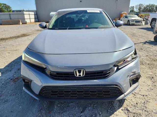 Photo 5 from auction – 2024 HONDA CIVIC TOURING with VIN 2HGFE1F93RH331673