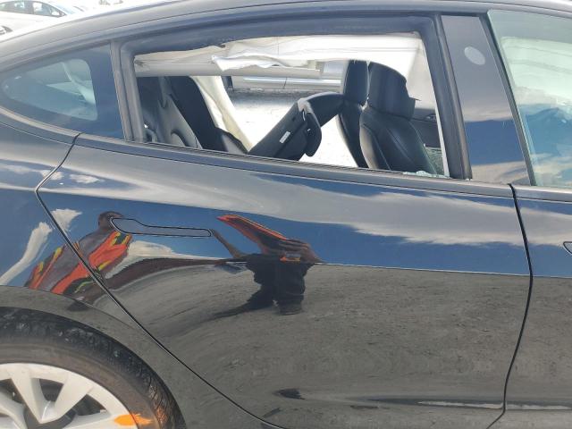 Photo 10 from auction – 2022 TESLA MODEL 3 with VIN 5YJ3E1EB5NF201495