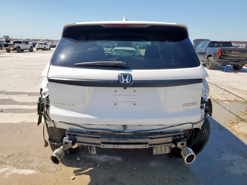 Photo 6 from auction – 2023 HONDA PASSPORT E with VIN 5FNYF8H56PB009006
