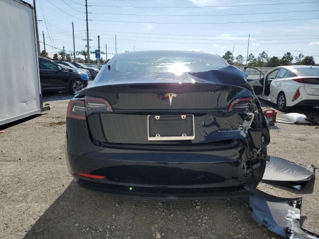 Photo 6 from auction – 2022 TESLA MODEL 3 with VIN 5YJ3E1EB7NF195344
