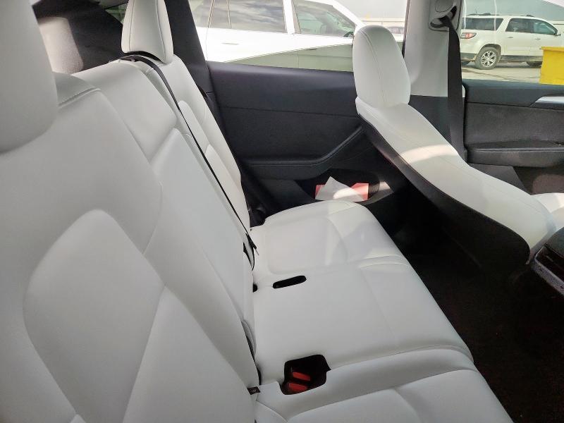 Photo 11 from auction – 2024 TESLA MODEL Y with VIN 7SAYGAEE0RF159319