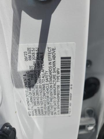 Photo 14 from auction – 2023 HONDA PASSPORT E with VIN 5FNYF8H05PB037156