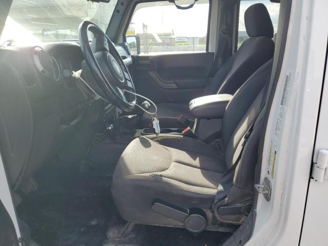 Photo 7 from auction – 2014 JEEP WRANGLER U with VIN 1C4BJWDG0EL119852