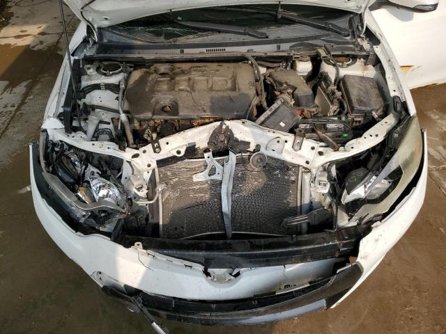 Photo 11 from auction – 2014 TOYOTA COROLLA L with VIN 5YFBURHEXEP023283