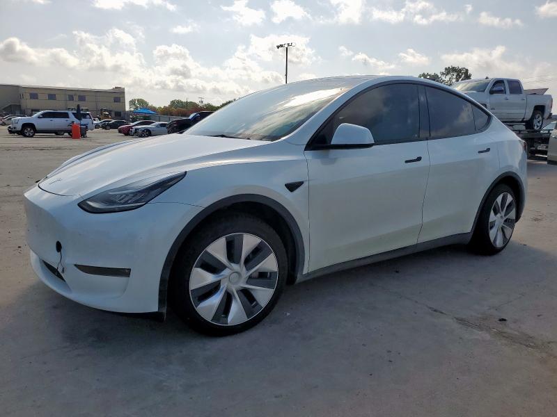 TESLA MODEL Y 2023 with VIN 7SAYGDEE6PA141502 - Photo from auction