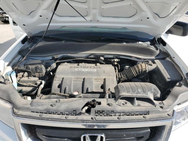 Photo 11 from auction – 2010 HONDA RIDGELINE with VIN 5FPYK1F28AB007946