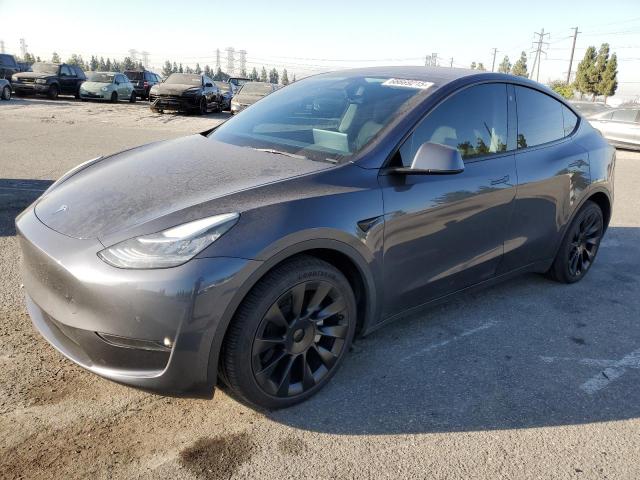 TESLA MODEL Y 2022 with VIN 7SAYGAEE0NF575901 - Photo from auction