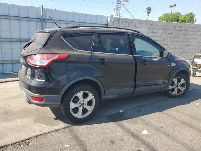 Photo 3 from auction – 2016 FORD ESCAPE SE with VIN 1FMCU9G92GUC17915