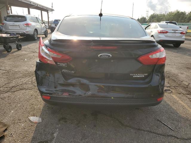Photo 6 from auction – 2014 FORD FOCUS TITANIUM with VIN 1FADP3J2XEL241588