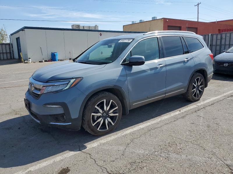 Photo 1 from auction – 2022 HONDA PILOT ELIT with VIN 5FNYF6H08NB040389