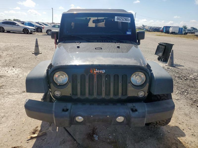 Photo 5 from auction – 2014 JEEP WRANGLER U with VIN 1C4BJWDG8EL244422