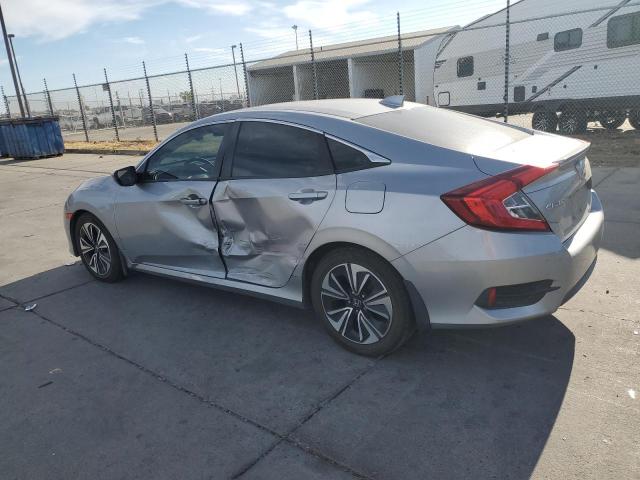 Photo 2 from auction – 2016 HONDA CIVIC EX with VIN 2HGFC1F39GH637811