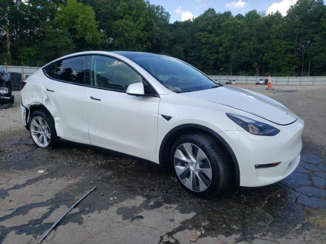 Photo 4 from auction – 2023 TESLA MODEL Y with VIN 7SAYGDEE9PF799351