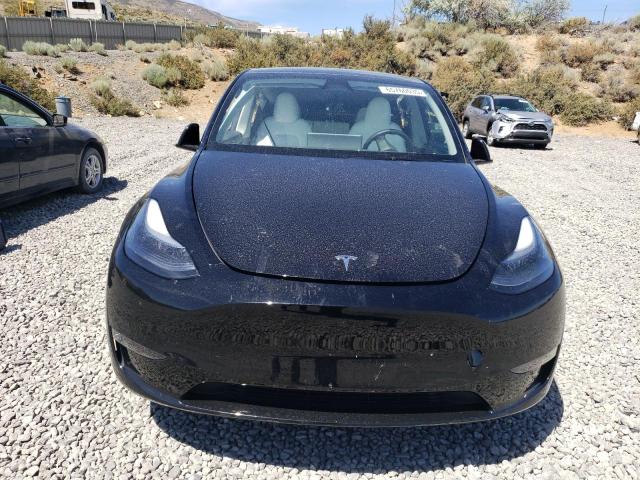 Photo 5 from auction – 2025 TESLA MODEL Y with VIN 7SAYGDEE4SF275775