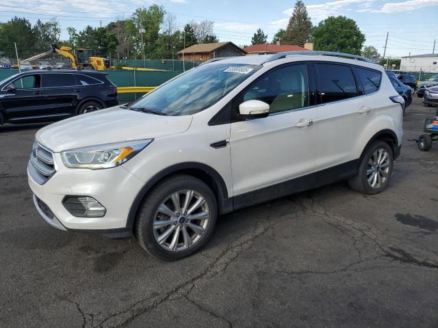 FORD ESCAPE TIT 2017 with VIN 1FMCU9JD8HUB77709 - Photo from auction