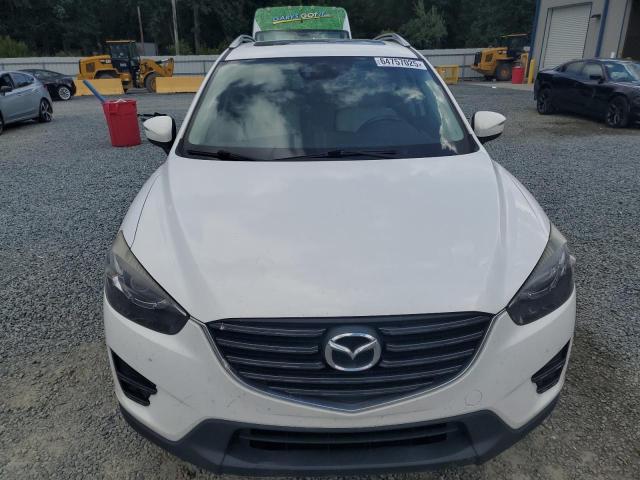 Photo 5 from auction – 2016 MAZDA CX-5 GT with VIN JM3KE2DY0G0897652