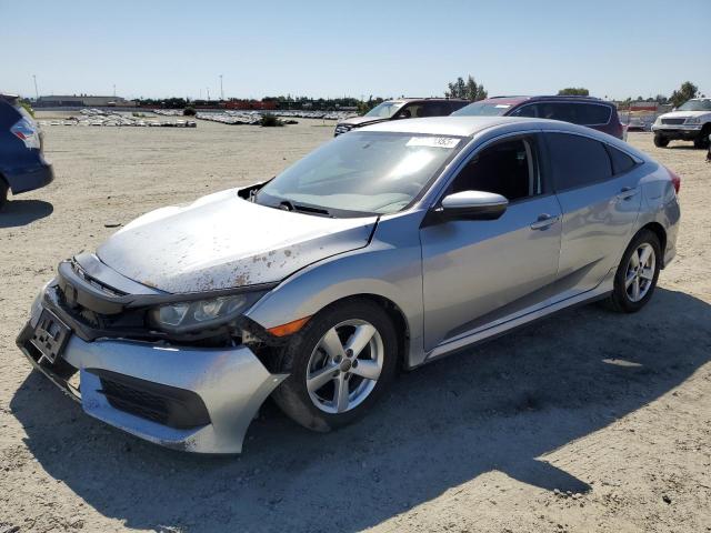 HONDA CIVIC LX 2018 with VIN 19XFC2F5XJE200201 - Photo from auction