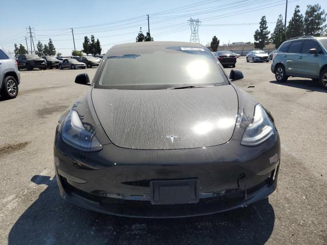 Photo 5 from auction – 2022 TESLA MODEL 3 with VIN 5YJ3E1EA4NF358409