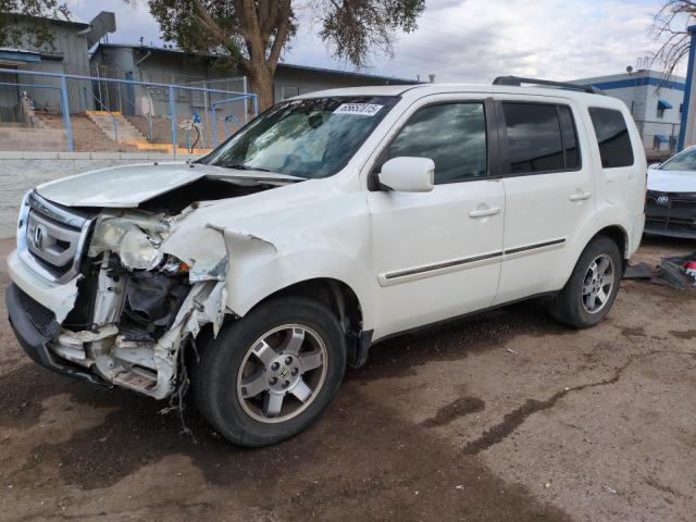 HONDA PILOT TOUR 2011 with VIN 5FNYF4H99BB074033 - Photo from auction