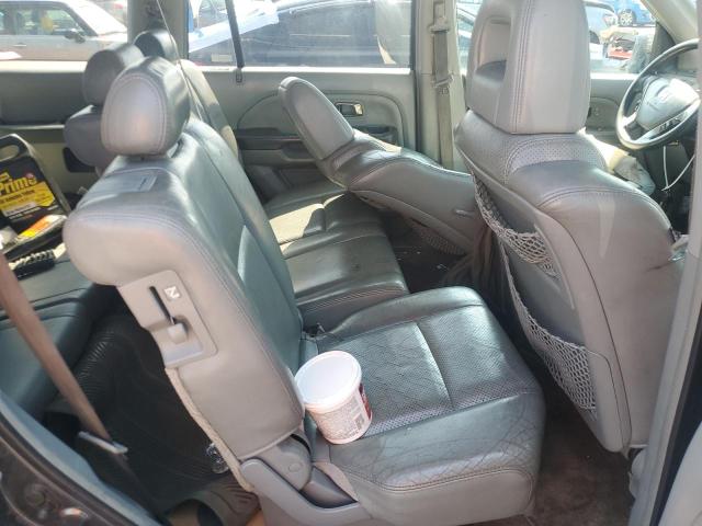 Photo 11 from auction – 2004 HONDA PILOT EX with VIN 2HKYF184X4H594006