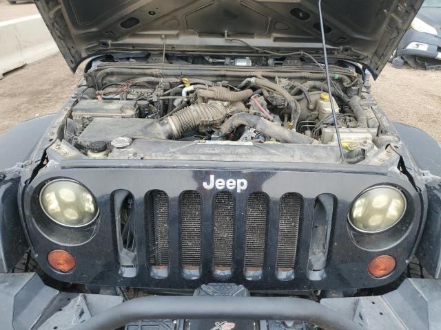 Photo 12 from auction – 2011 JEEP WRANGLER U with VIN 1J4HA5H11BL508712