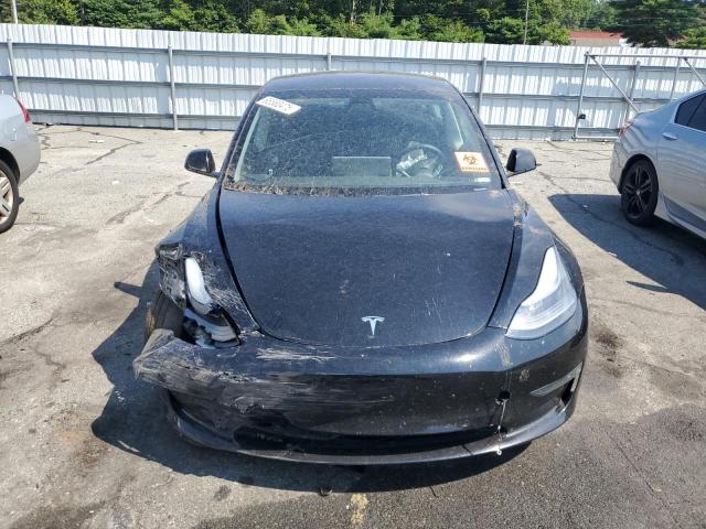 Photo 5 from auction – 2022 TESLA MODEL 3 with VIN 5YJ3E1EB8NF104873