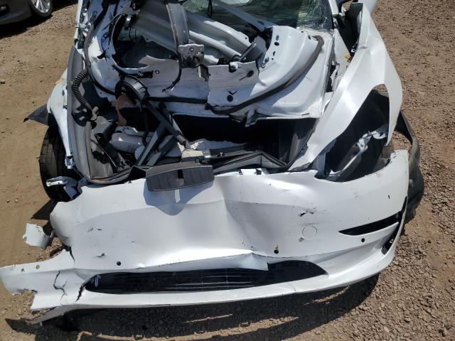 Photo 11 from auction – 2021 TESLA MODEL 3 with VIN 5YJ3E1EC6MF076644