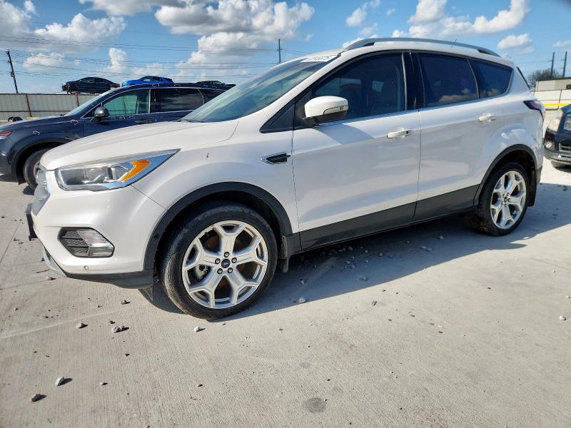 FORD ESCAPE TIT 2017 with VIN 1FMCU9J97HUE94487 - Photo from auction