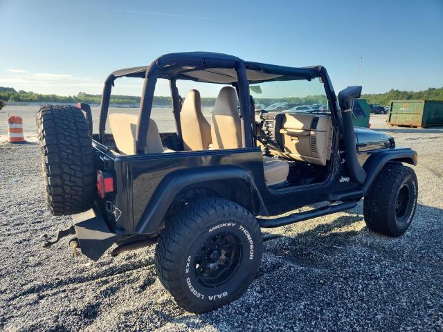 Photo 3 from auction – 2002 JEEP WRANGLER SPO with VIN 1J4FA49S62P749862