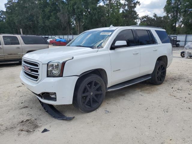 GMC YUKON SLE 2017 with VIN 1GKS1AKC0HR195631 - Photo from auction