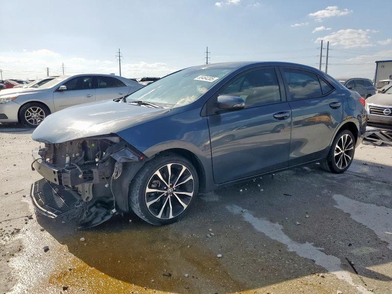 TOYOTA COROLLA L 2018 with VIN 5YFBURHE2JP829161 - Photo from auction