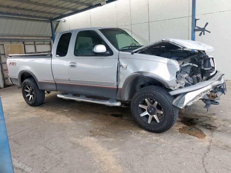 Photo 4 from auction – 2002 FORD F150 with VIN 1FTRX18L12NA99201