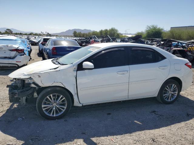 TOYOTA COROLLA L 2014 with VIN 5YFBURHE2EP055094 - Photo from auction