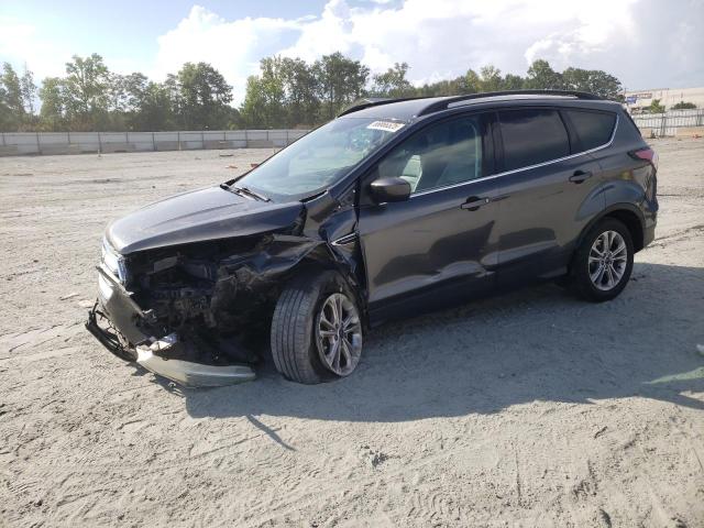 FORD ESCAPE SE 2017 with VIN 1FMCU0GD6HUD38142 - Photo from auction