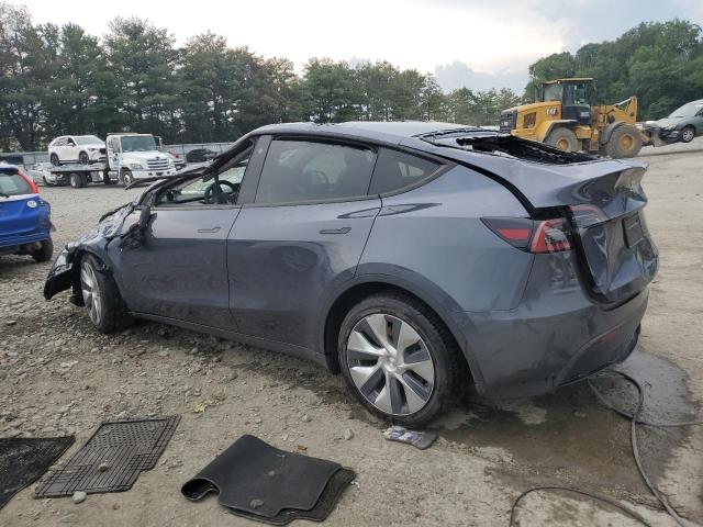 Photo 2 from auction – 2023 TESLA MODEL Y with VIN 7SAYGAEE3PF610028
