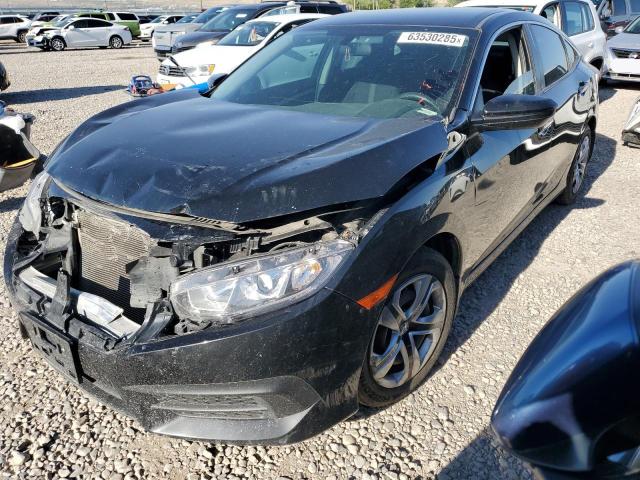 HONDA CIVIC LX 2018 with VIN 19XFC2F58JE024376 - Photo from auction