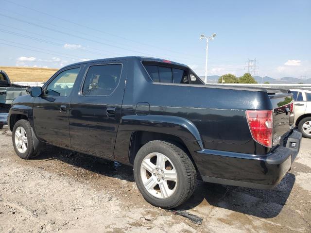 Photo 2 from auction – 2011 HONDA RIDGELINE with VIN 5FPYK1F51BB008223