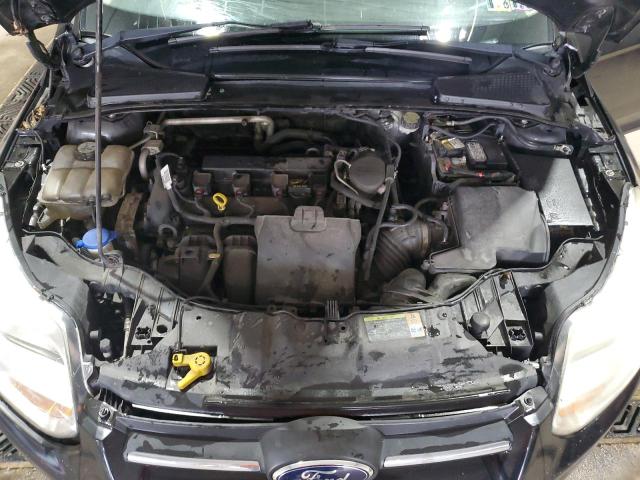Photo 11 from auction – 2013 FORD FOCUS SE with VIN 1FADP3F21DL348827