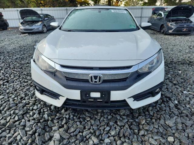 Photo 5 from auction – 2018 HONDA CIVIC EX with VIN JHMFC1F33JX019934