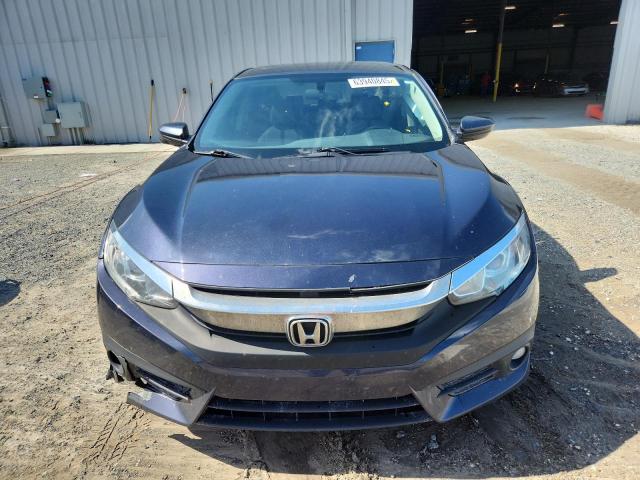 Photo 5 from auction – 2018 HONDA CIVIC EX with VIN 2HGFC1F33JH646141
