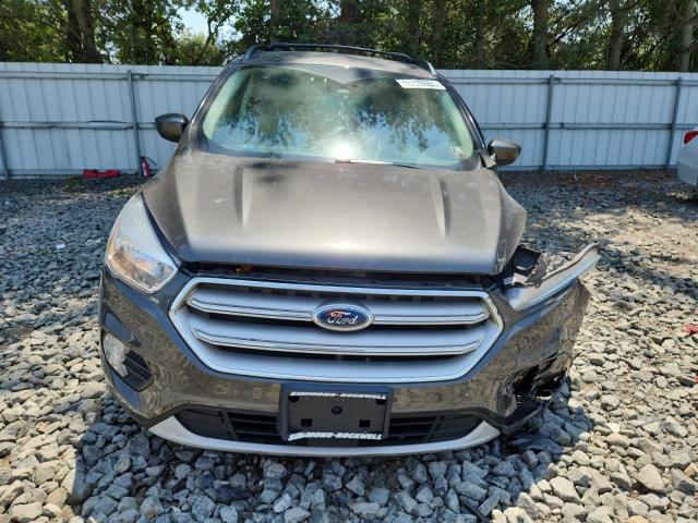 Photo 5 from auction – 2018 FORD ESCAPE SE with VIN 1FMCU9GD1JUD06533