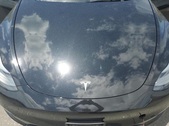 Photo 11 from auction – 2023 TESLA MODEL Y with VIN 7SAYGDEF0PF958265
