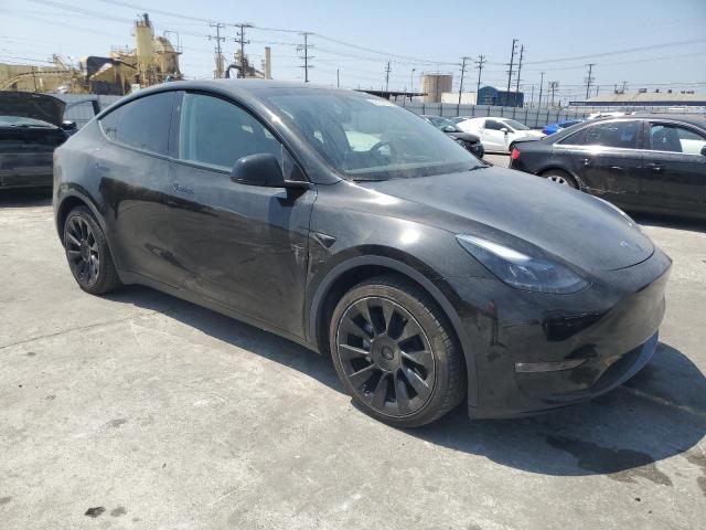 Photo 4 from auction – 2023 TESLA MODEL Y with VIN 7SAYGAEE6PF796339
