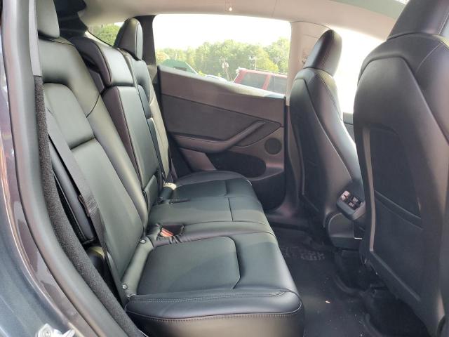 Photo 11 from auction – 2023 TESLA MODEL Y with VIN 7SAYGDEE2PA060139