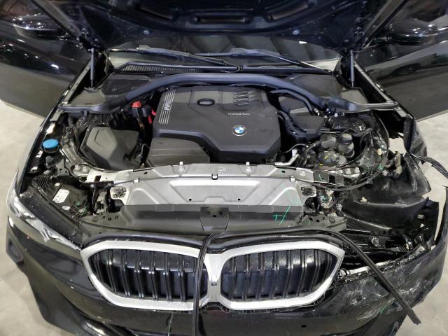 Photo 11 from auction – 2023 BMW 330I with VIN 3MW69FF01P8D23285