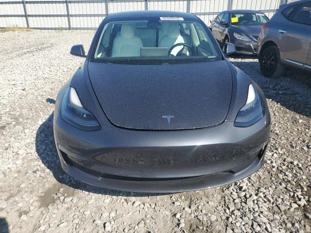 Photo 5 from auction – 2021 TESLA MODEL 3 with VIN 5YJ3E1EB0MF037233